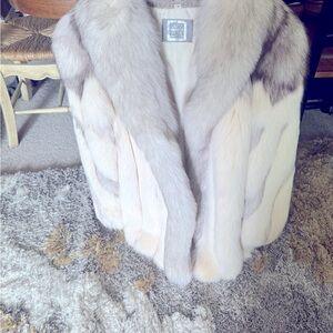 Elegant White and Gray Fox Fur Coat with Luxurious colors of gray and cream.
